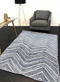 Artisan Blue Chevron Rug styled with furniture