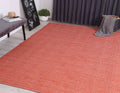Bondi Chevron Tamarind and White Wool Blend Rug styled with furniture