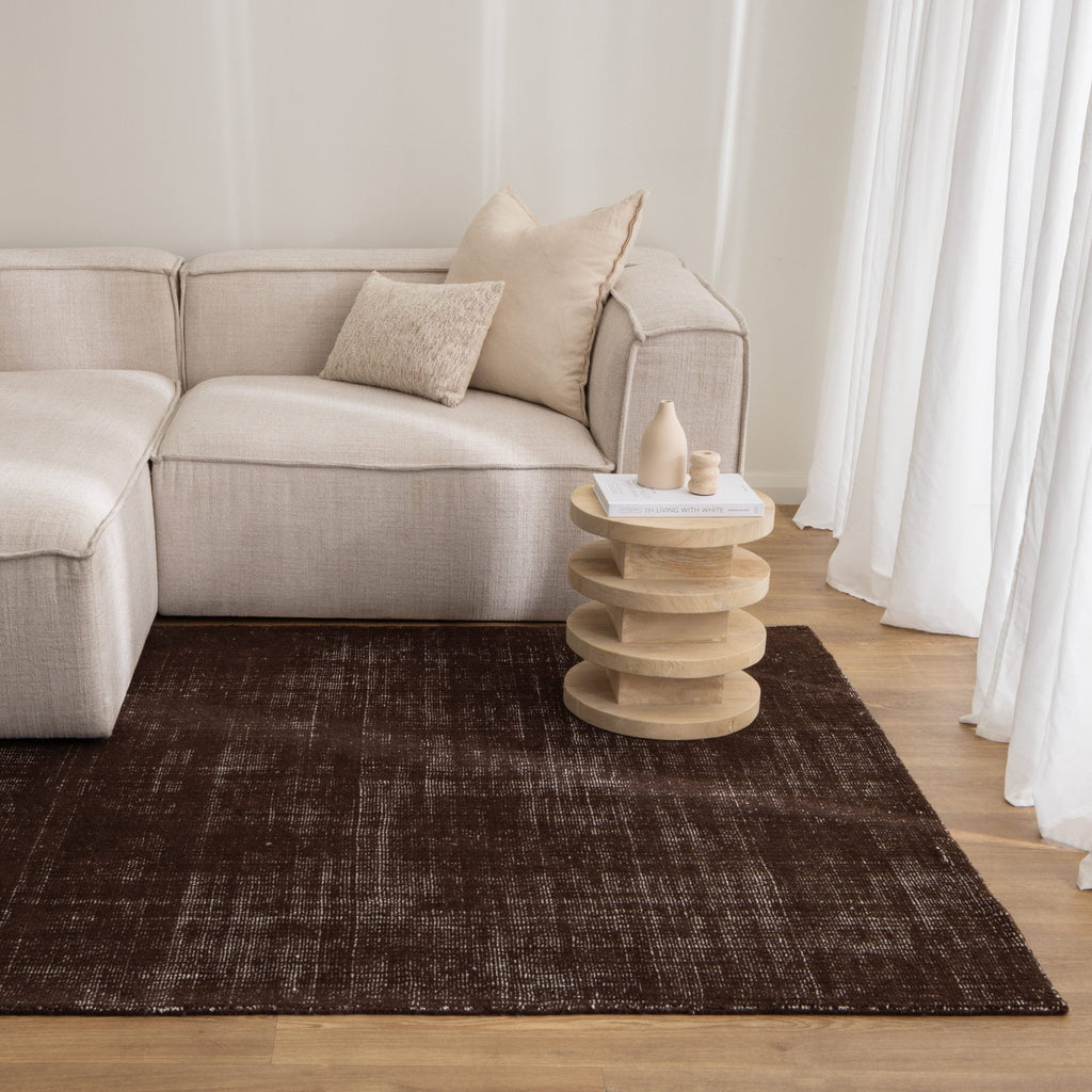 Harbour Chocolate Brown Indoor Outdoor Rug styled with furniture