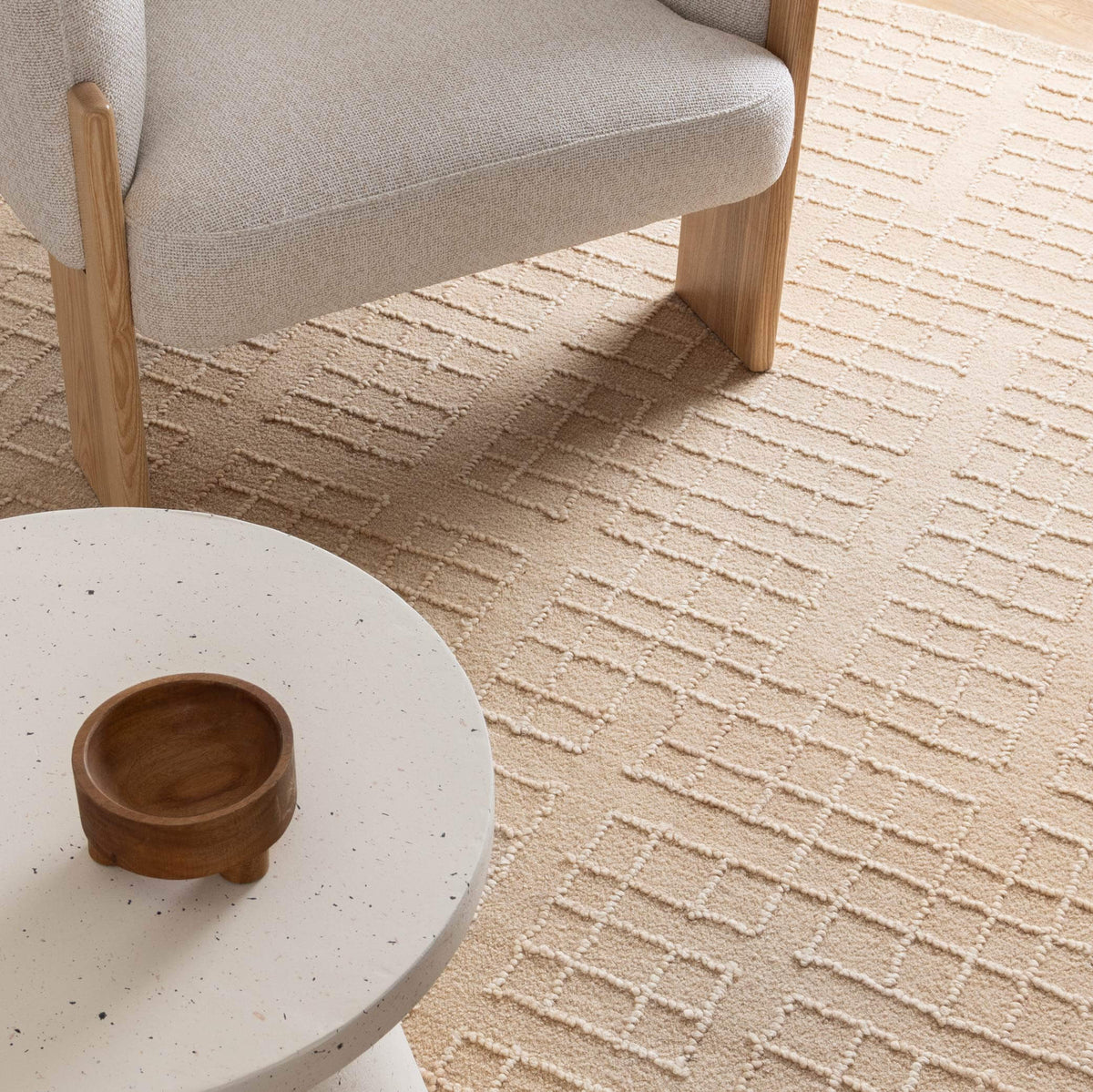 Abasco Croissant Beige Knitted Wool Rug room view