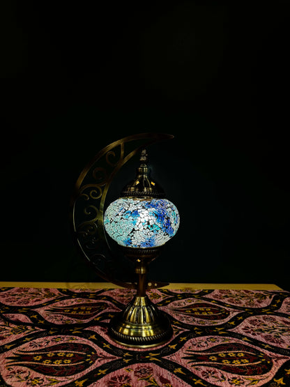 Celestial Blue Turkish Mosaic Lamp - Crescent Moon Design-Shop the Celestial Blue Turkish Mosaic Lamp! Features soft blue and white crackled mosaic design with a crescent moon stand. Includes LED bulb. Perfect for gifting or home decor.-Bazaar G Rugs N Gi