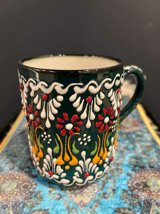 Ceramic Mug Dark Green Colourful-Elevate your daily coffee or tea experience with our Ceramic Mug. Crafted with premium, safe materials, this mug features an ergonomic handle, classic design, and easy maintenance. Ideal for hot or cold beverages, it's a s