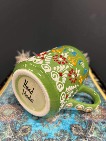 Ceramic Mug Green Colourful-Elevate your daily coffee or tea experience with our Ceramic Mug. Crafted with premium, safe materials, this mug features an ergonomic handle, classic design, and easy maintenance. Ideal for hot or cold beverages, it's a stylis