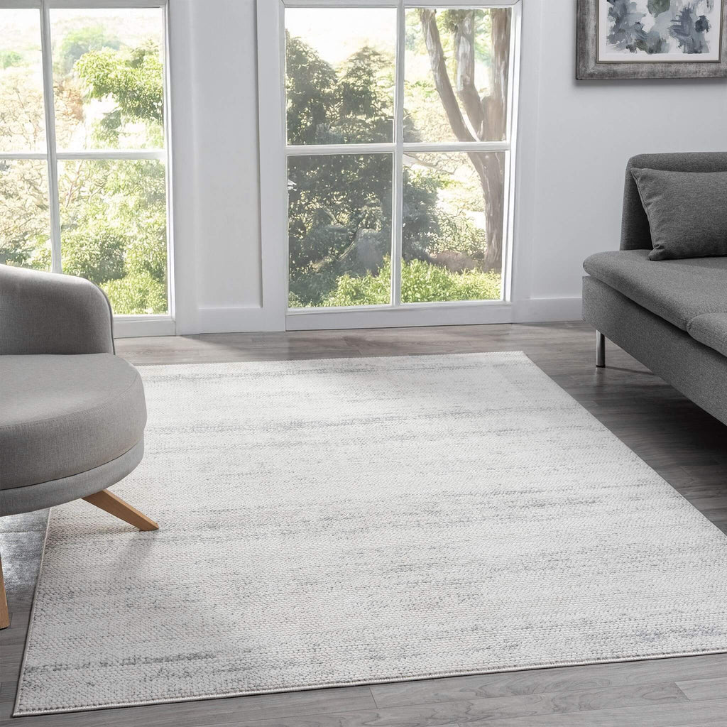 Cream Area Rug with plush, non-shed pile and all-side binding. Power-loomed in Türkiye for durable, easy-care elegance in modern living spaces.