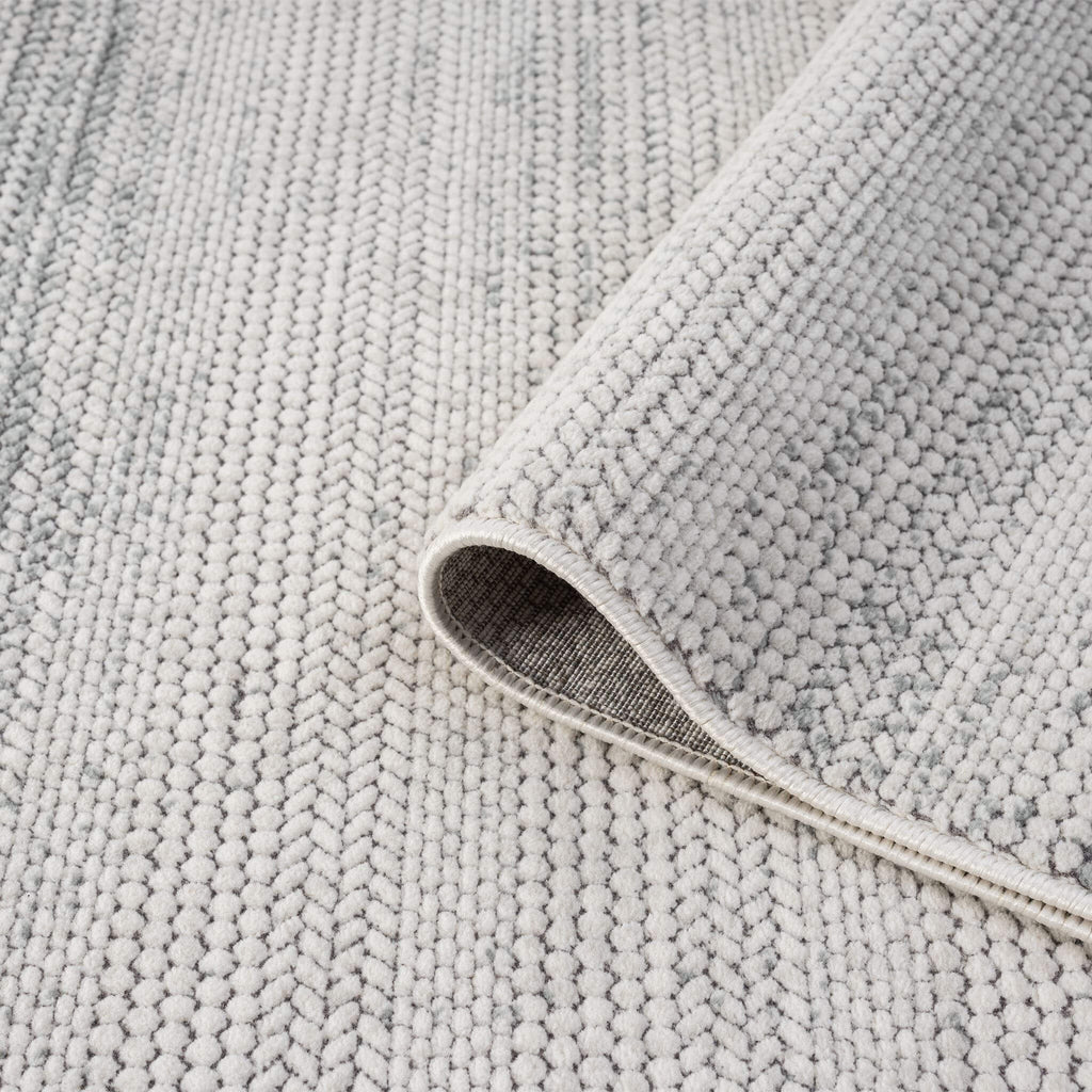 Cream Area Rug with plush, non-shed pile and all-side binding. Power-loomed in Türkiye for durable, easy-care elegance in modern living spaces.