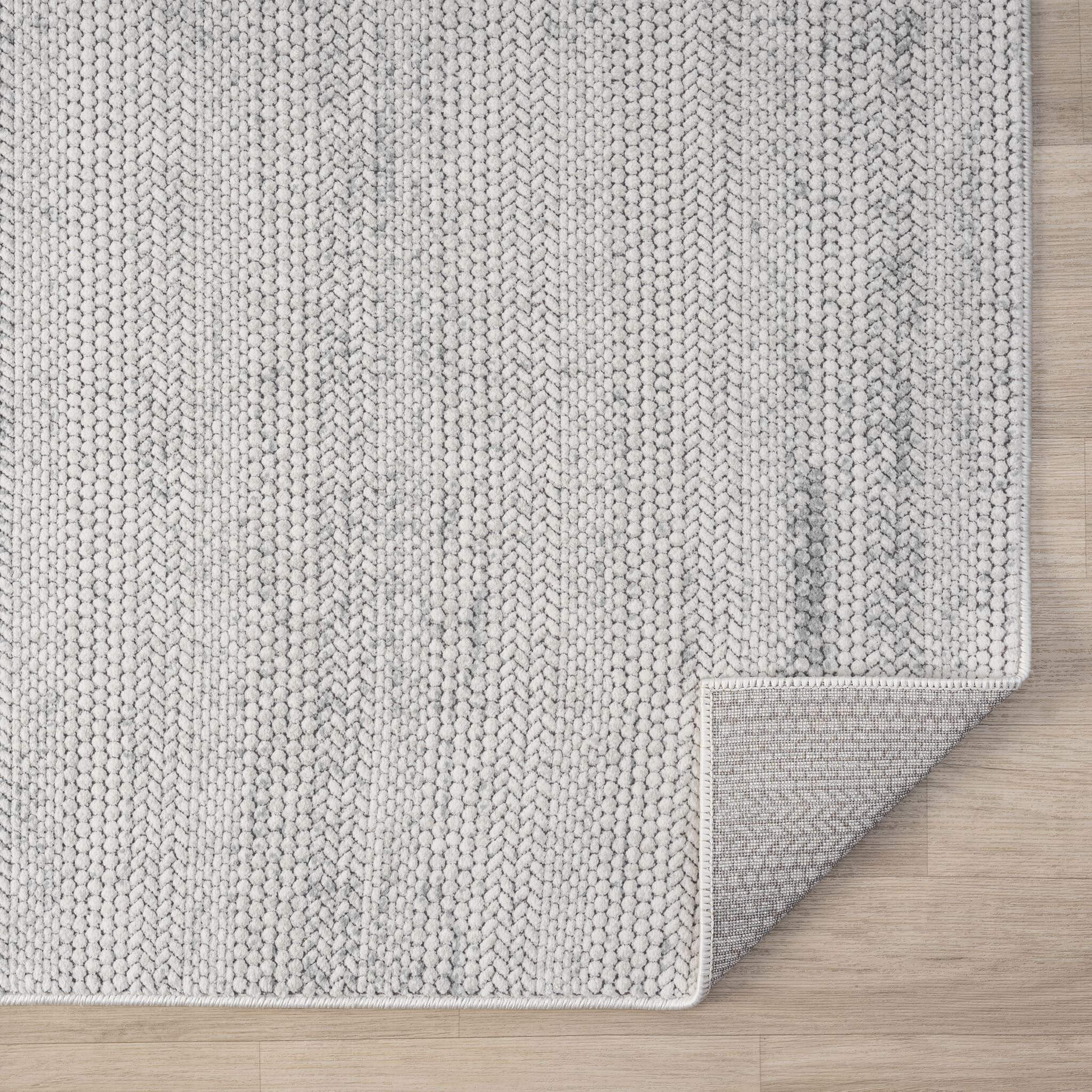 Cream Area Rug with plush, non-shed pile and all-side binding. Power-loomed in Türkiye for durable, easy-care elegance in modern living spaces.