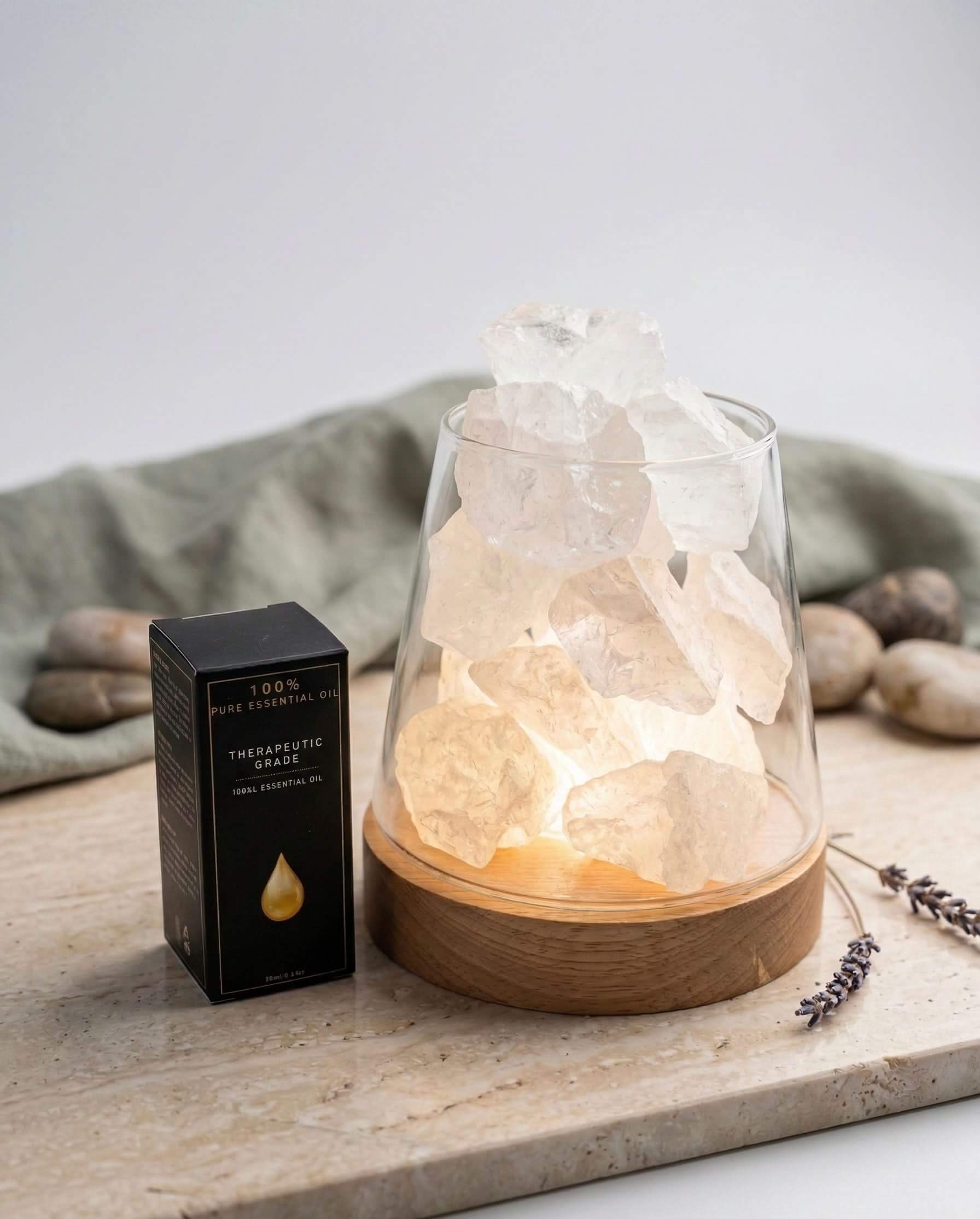 Crystal Stone Essential Oil Diffuser Lamp with essential oil box and crystals in a calming setting.