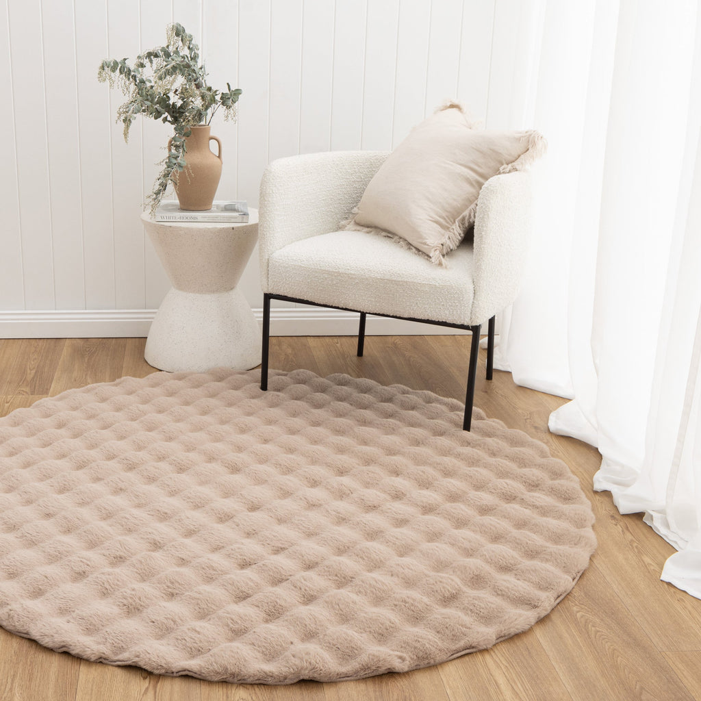 Purity Washable Round Rug Dark Beige styled with furniture