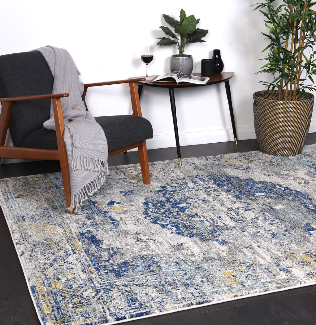 Delicate Faded Blue and Yellow Rug - DELI02 styled with furniture