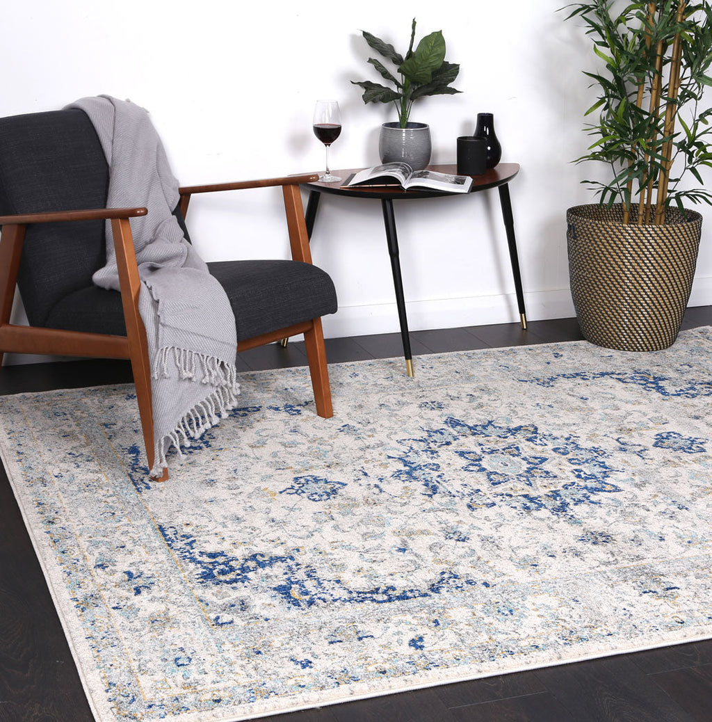 Delicate Magnificence Ivory and Blue Rug - DELI13 styled with furniture