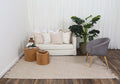 Diego Geometric Brown Wool Rug styled in a furnished living room