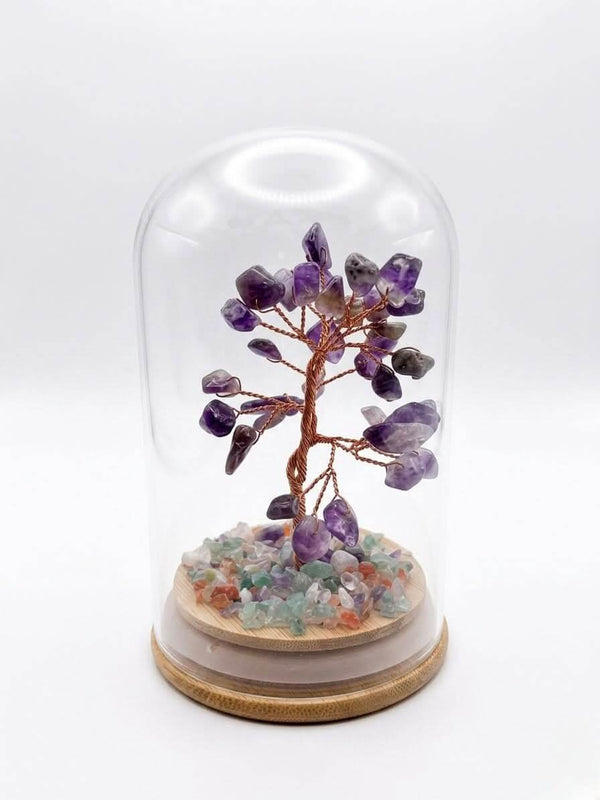 Amethyst Crystal Tree in Glass Dome showcases a decorative gemstone tree with purple crystals on a wooden base.