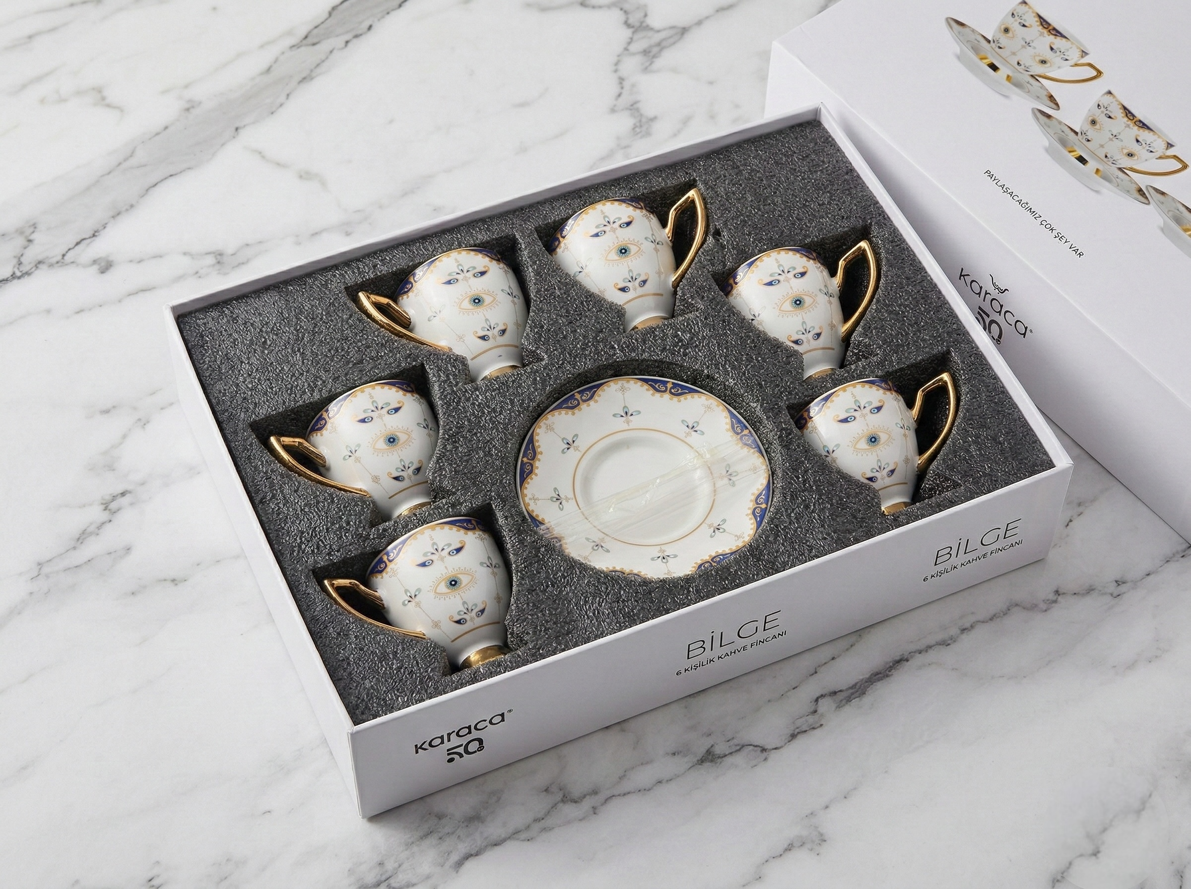 Karaca Bilge Turkish Coffee Cup set in elegant box with Nazar motif, blue details, and gold-tone accents.