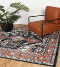 Estate Leoplda Traditional Black Rug - 01BLAC styled with furniture