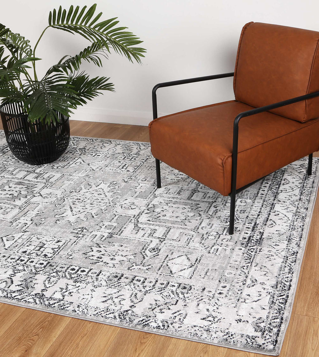 Estate Willow Creek Traditional Grey Rug - 14GREY styled with furniture