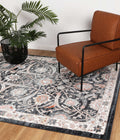 Estate Mylestone Traditional Charcoal Rug - 20CHAR styled with furniture