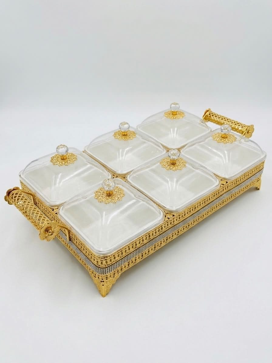 Elegant 6-compartment luxury gold serveware tray with clear lids, perfect for serving at gatherings.