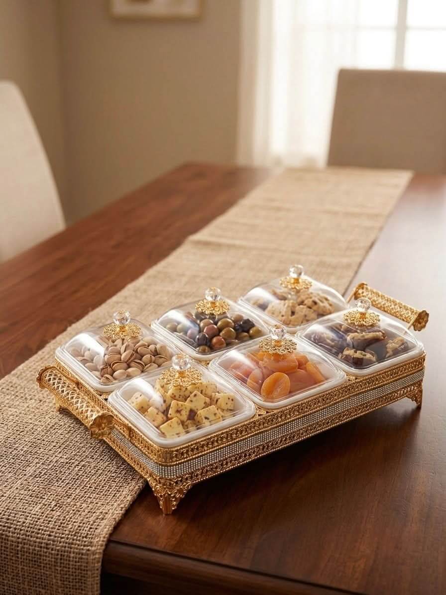 Elegant 6-compartment luxury gold serveware tray filled with gourmet snacks, perfect for dining tables and gatherings.