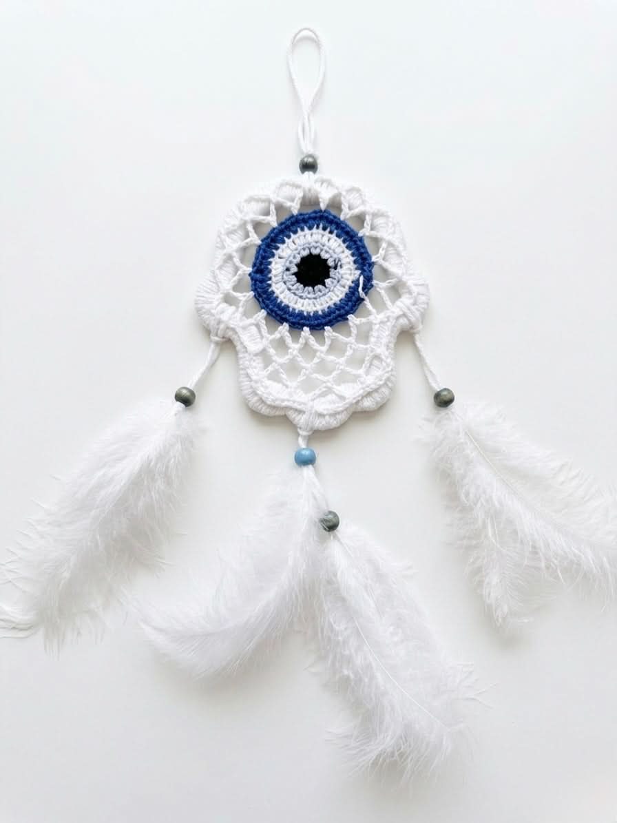 Evil Eye Dream Catcher handcrafted wall art with white crochet and feathers, measuring 10x15cm.