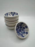 Evil Eye Turkish Ceramic Mini Bowls stacked with vibrant blue Nazar design on white glaze.