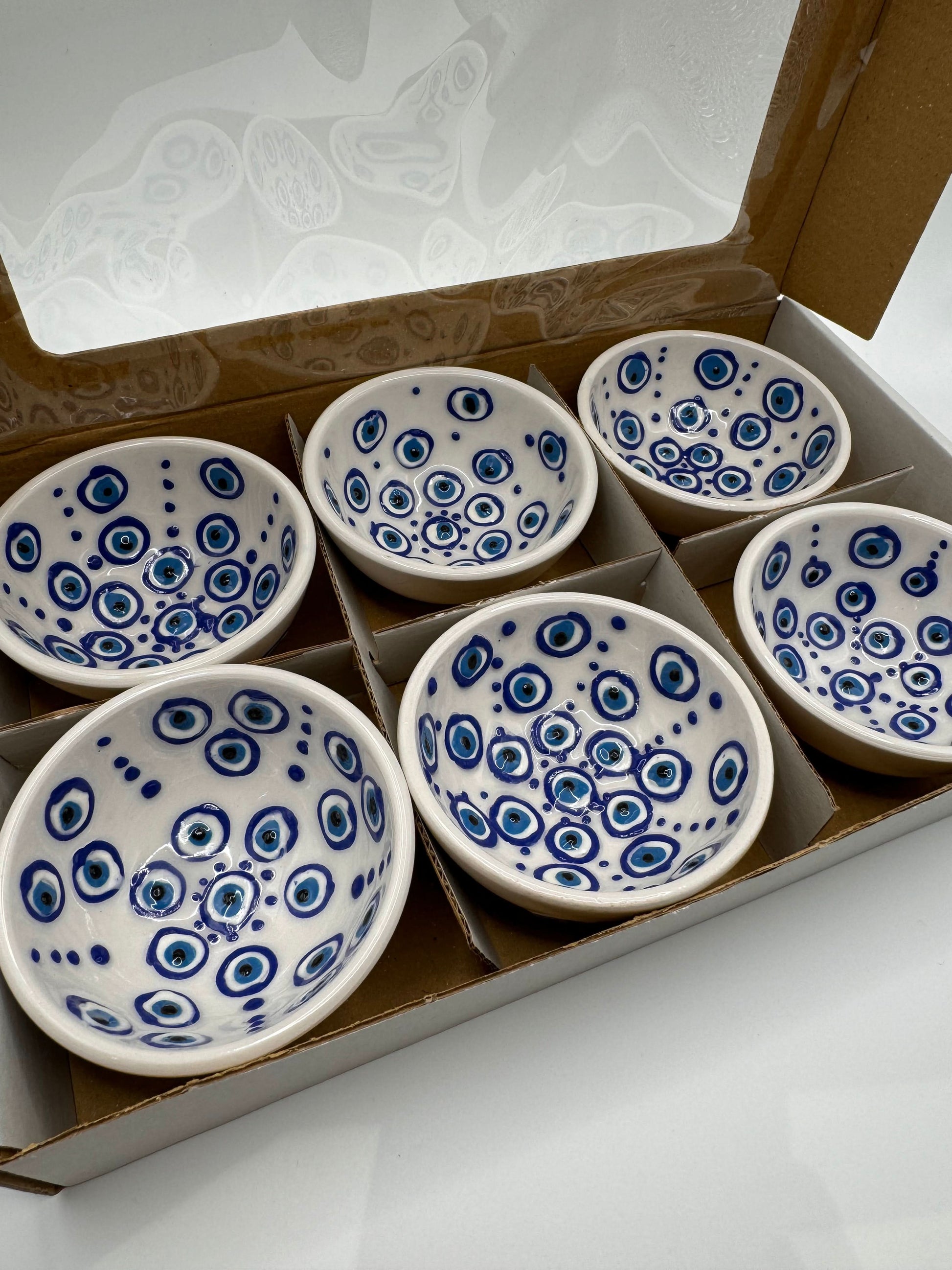 Evil Eye Turkish Ceramic Mini Bowls in a gift box, featuring blue Nazar motifs on white glaze, perfect for serving or decoration.