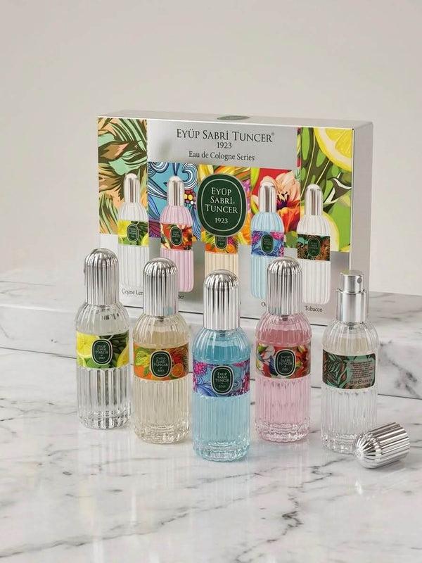 Eyüp Sabri Tuncer Eau de Cologne Gift Set featuring five 16ml bottles in a stylish packaging on a marble surface.