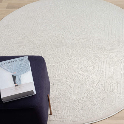 Fable 471 Ivory Round-This serene collection, with its muted tones and patterns, brings harmony and luxury to your floors while being restful for the eyes. The highly decorative and beautifully textured pile is made from polyester and polypropylene, power
