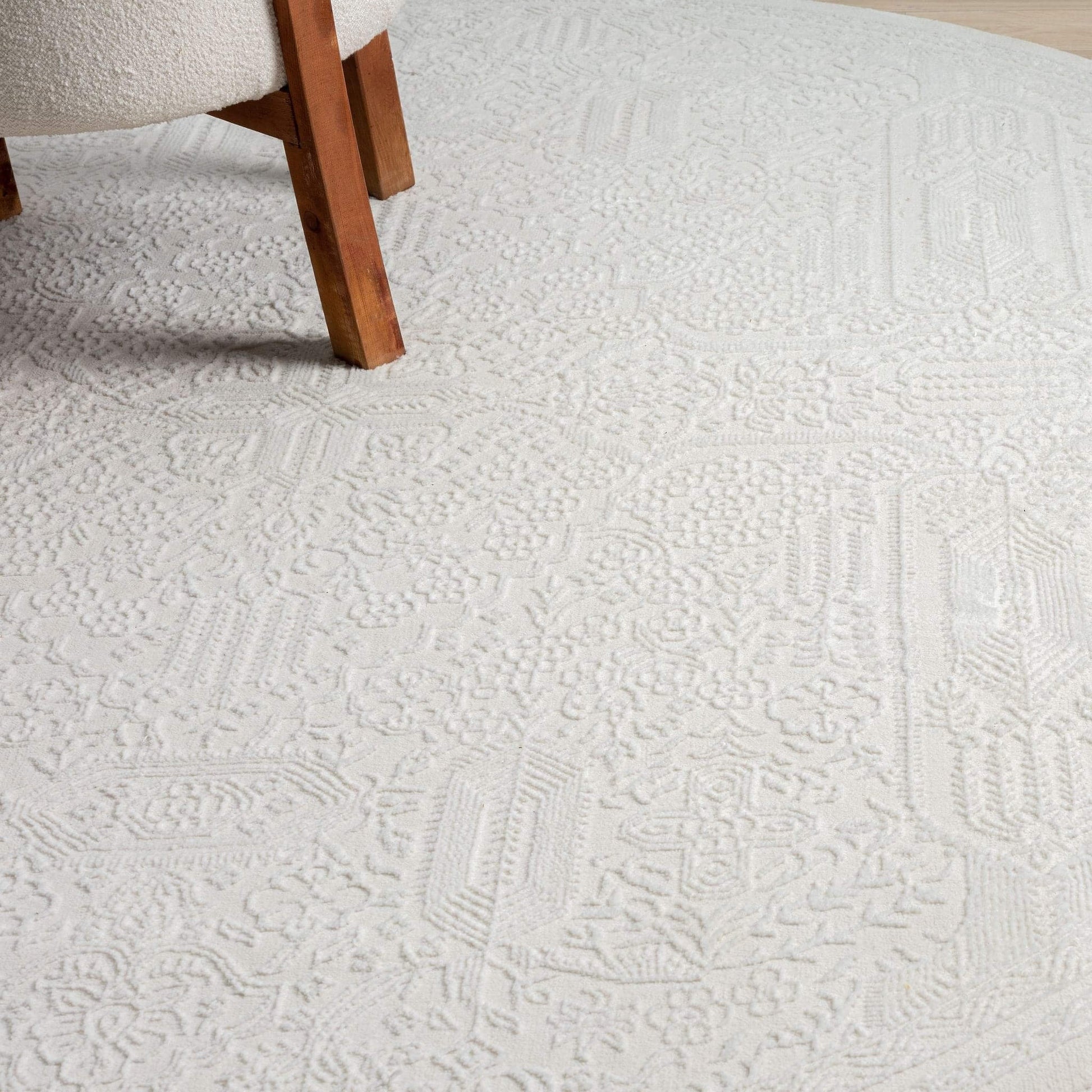 Fable 471 Ivory Round-This serene collection, with its muted tones and patterns, brings harmony and luxury to your floors while being restful for the eyes. The highly decorative and beautifully textured pile is made from polyester and polypropylene, power