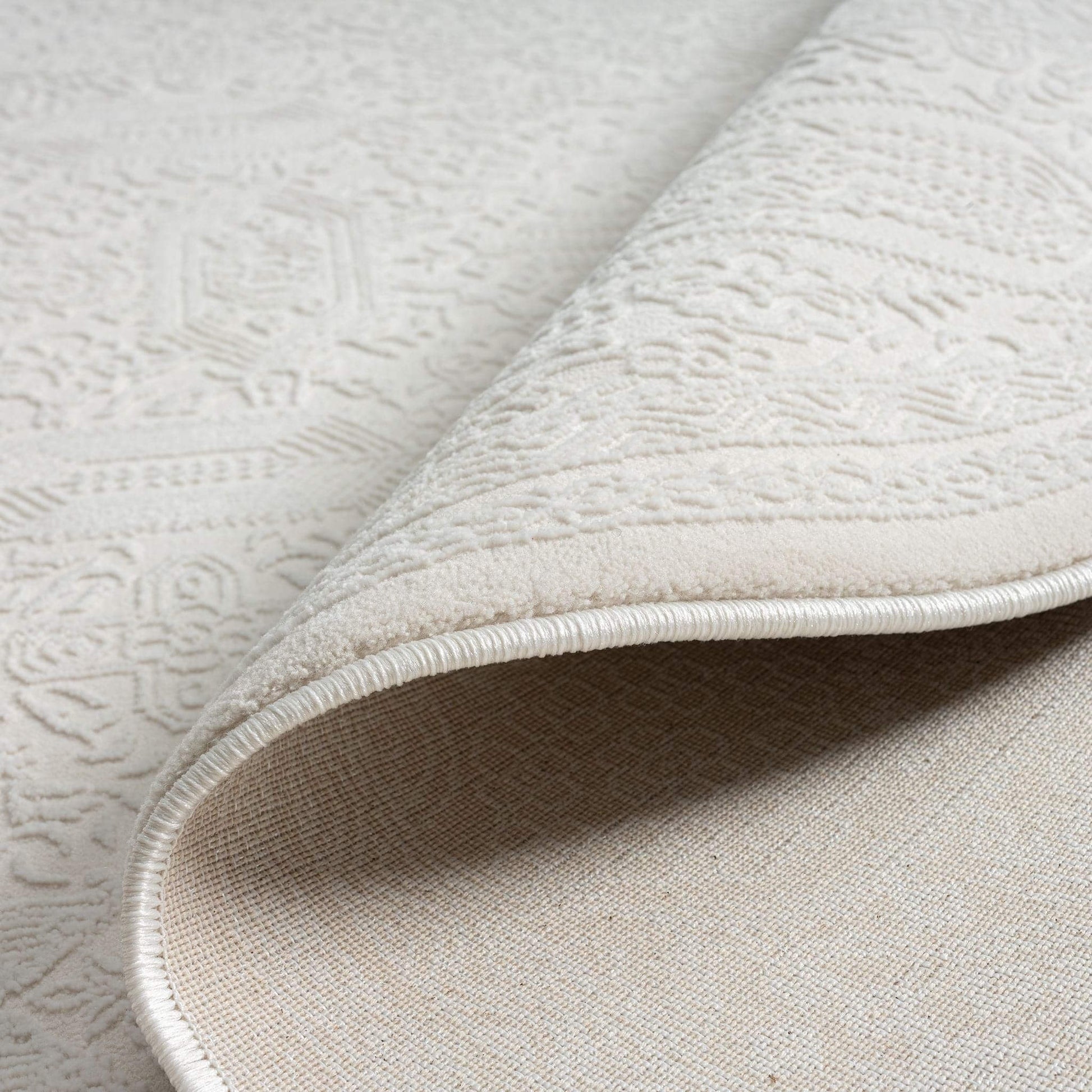 Fable 471 Ivory Round-This serene collection, with its muted tones and patterns, brings harmony and luxury to your floors while being restful for the eyes. The highly decorative and beautifully textured pile is made from polyester and polypropylene, power