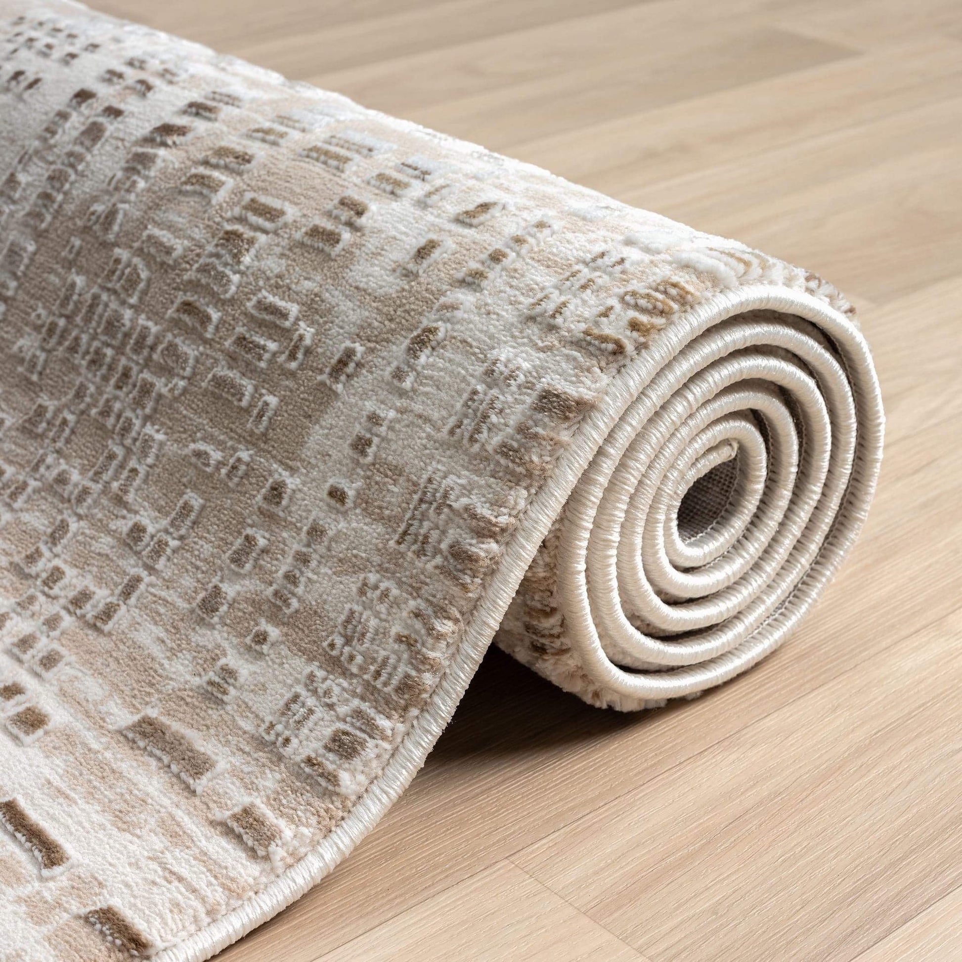 Fable 473 Taupe Runner-This serene collection, with its muted tones and patterns, brings harmony and luxury to your floors while being restful for the eyes. The highly decorative and beautifully textured pile is made from polyester and polypropylene, powe