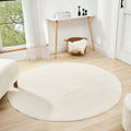 Cream round area rug on light wooden floor, enhancing minimalist decor with softness and style.