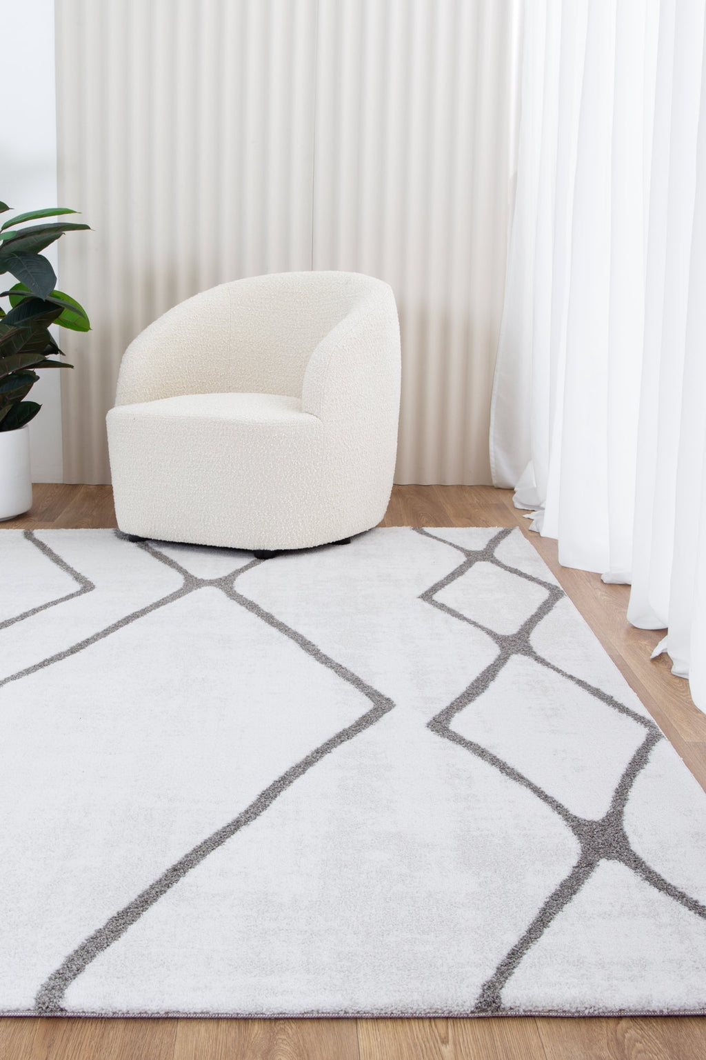 Grace Diamond Polyester Rug - GRAC06 styled with furniture