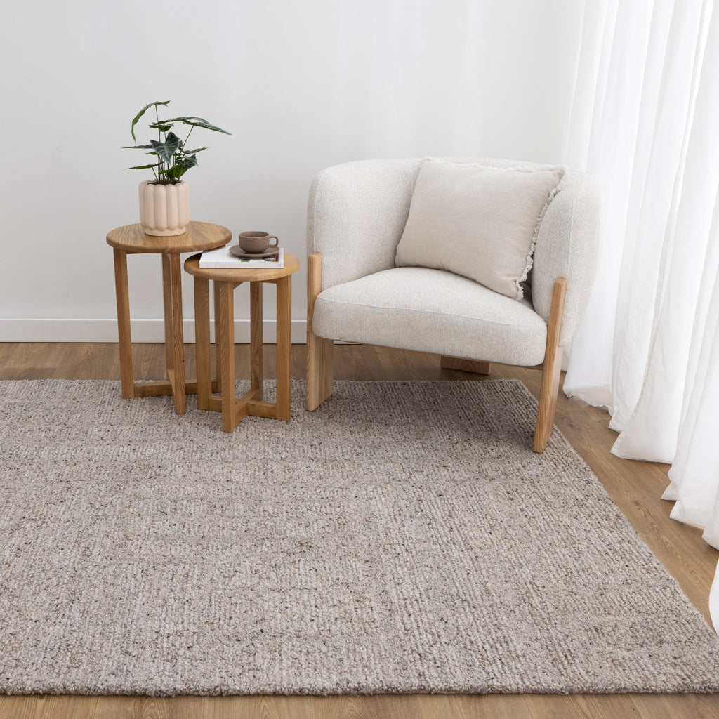 Seren Greige Modern Wool Rug styled with furniture