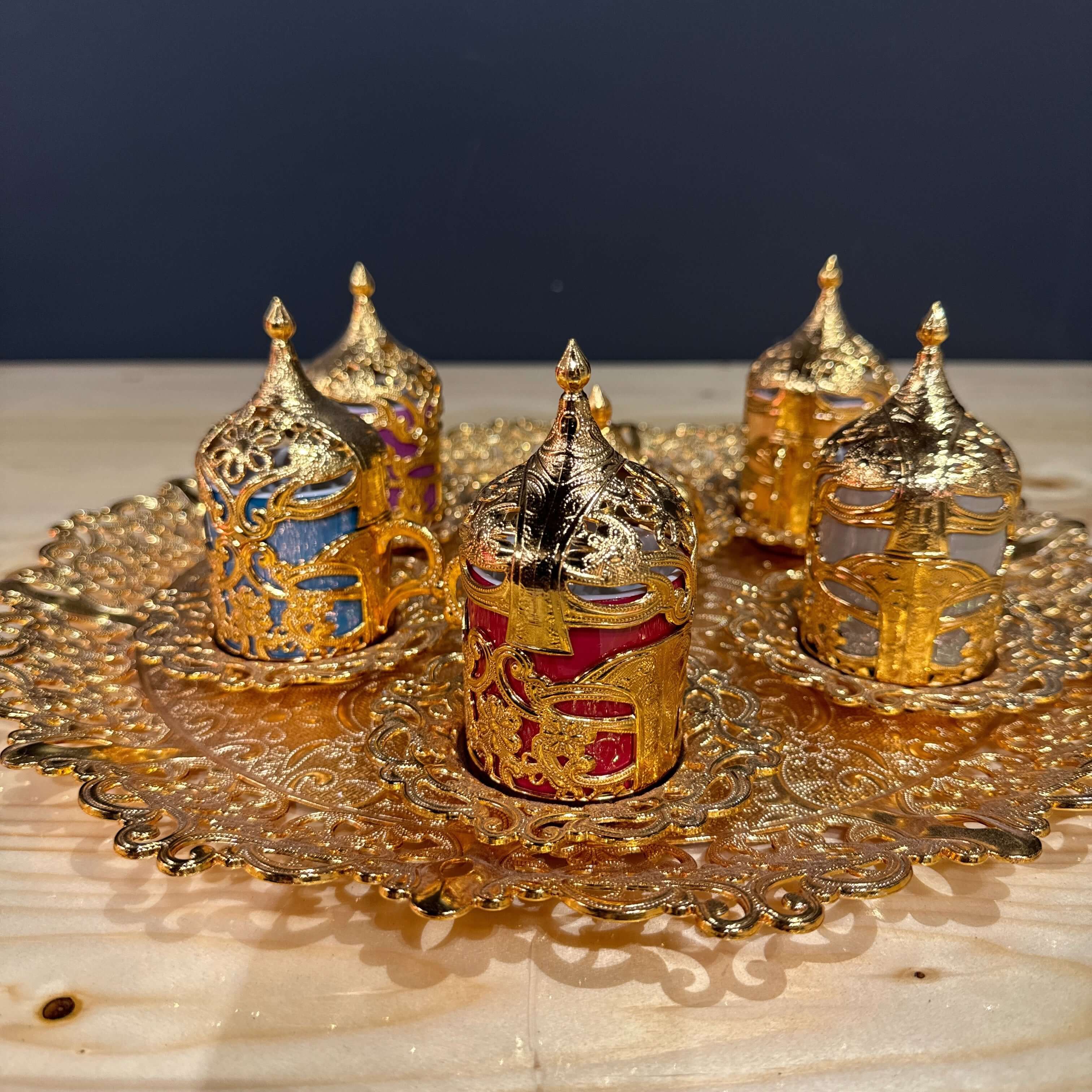 Gold Ottoman-Style Coffee Cup Set displayed on ornate tray with colorful ornate cups.