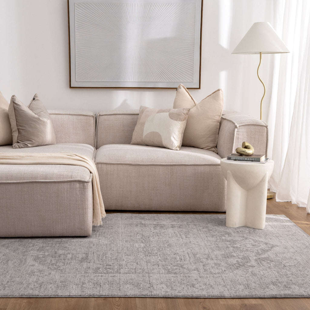 Heritage H103 Grey Distressed Medallion Rug styled with furniture