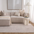 Heritage H106 Beige Distressed Border Rug styled with furniture