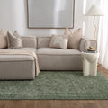 Heritage H107 Green Distressed Border Rug styled with furniture