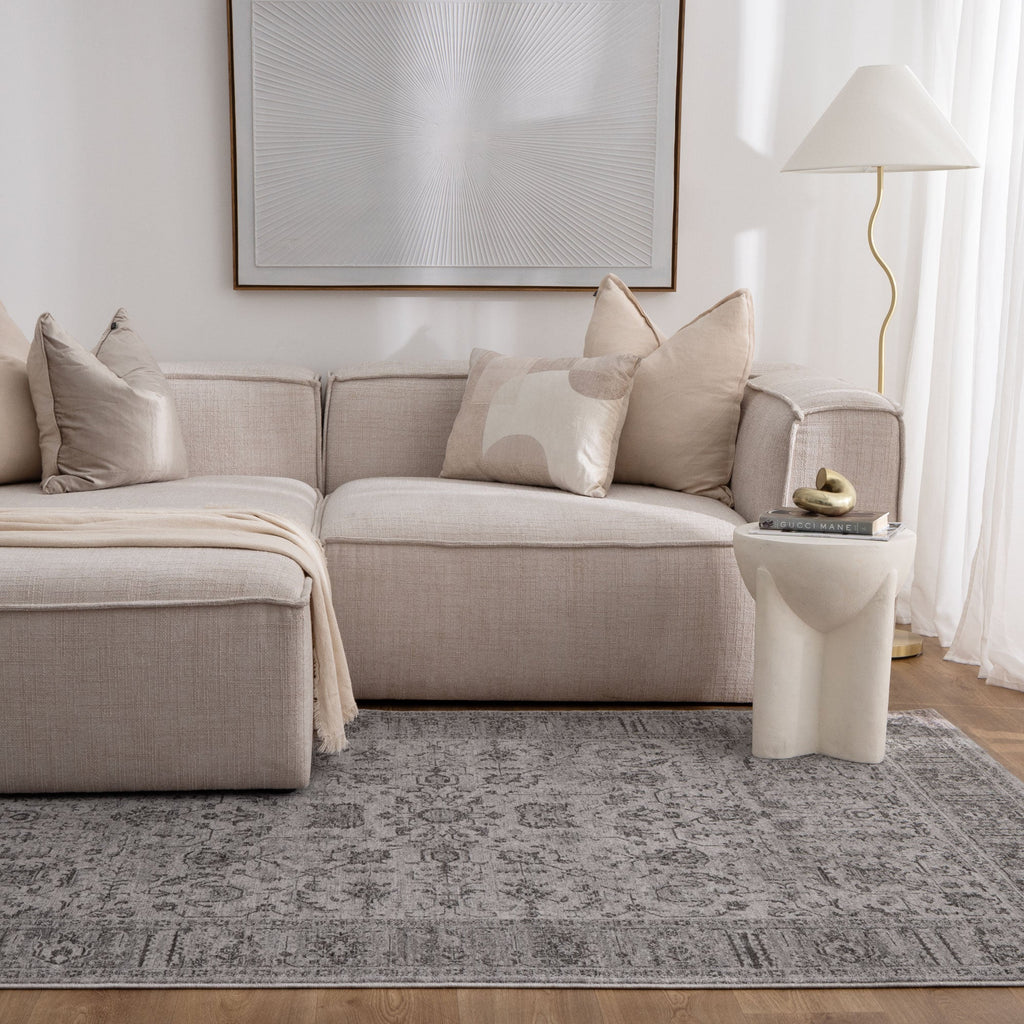 Heritage H108 Grey Distressed Border Rug styled with furniture