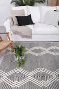Himalaya Saw Ivory Wool Blend Rug - 100 styled with furniture