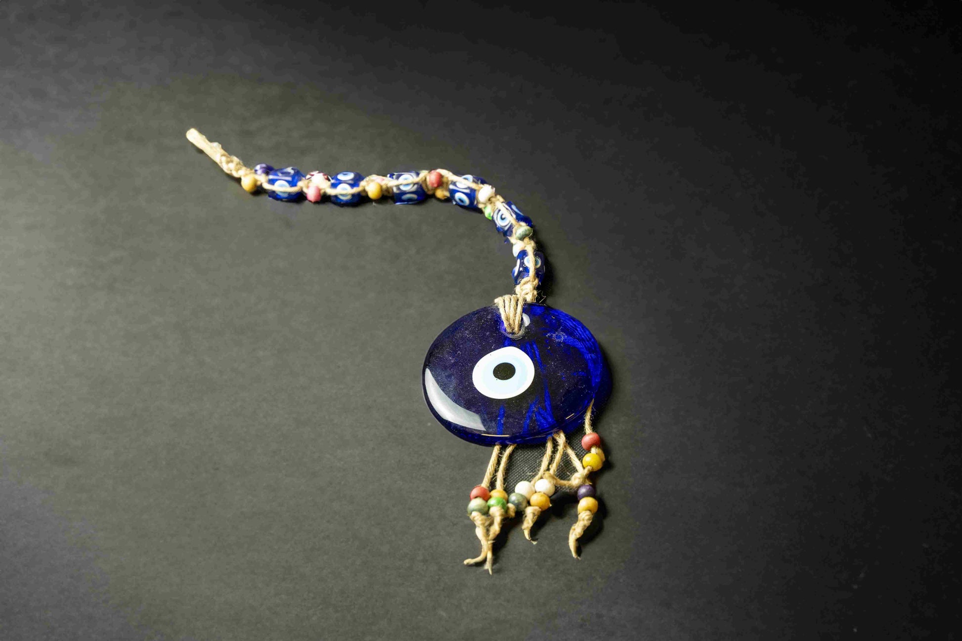 Hanging Evil Eye with Evil Eye Beads-This hanging evil eye is a great way to harness the protective power of ancient mythology and ward off negative energy. Its unique design is used to safeguard your home and draw positive energy, helping you create a sa