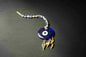 Hanging Evil Eye with Evil Eye Beads-This hanging evil eye is a great way to harness the protective power of ancient mythology and ward off negative energy. Its unique design is used to safeguard your home and draw positive energy, helping you create a sa