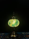 Mosaic Table Lamp Green Crackle illuminating a vibrant glass mosaic design in warm light.