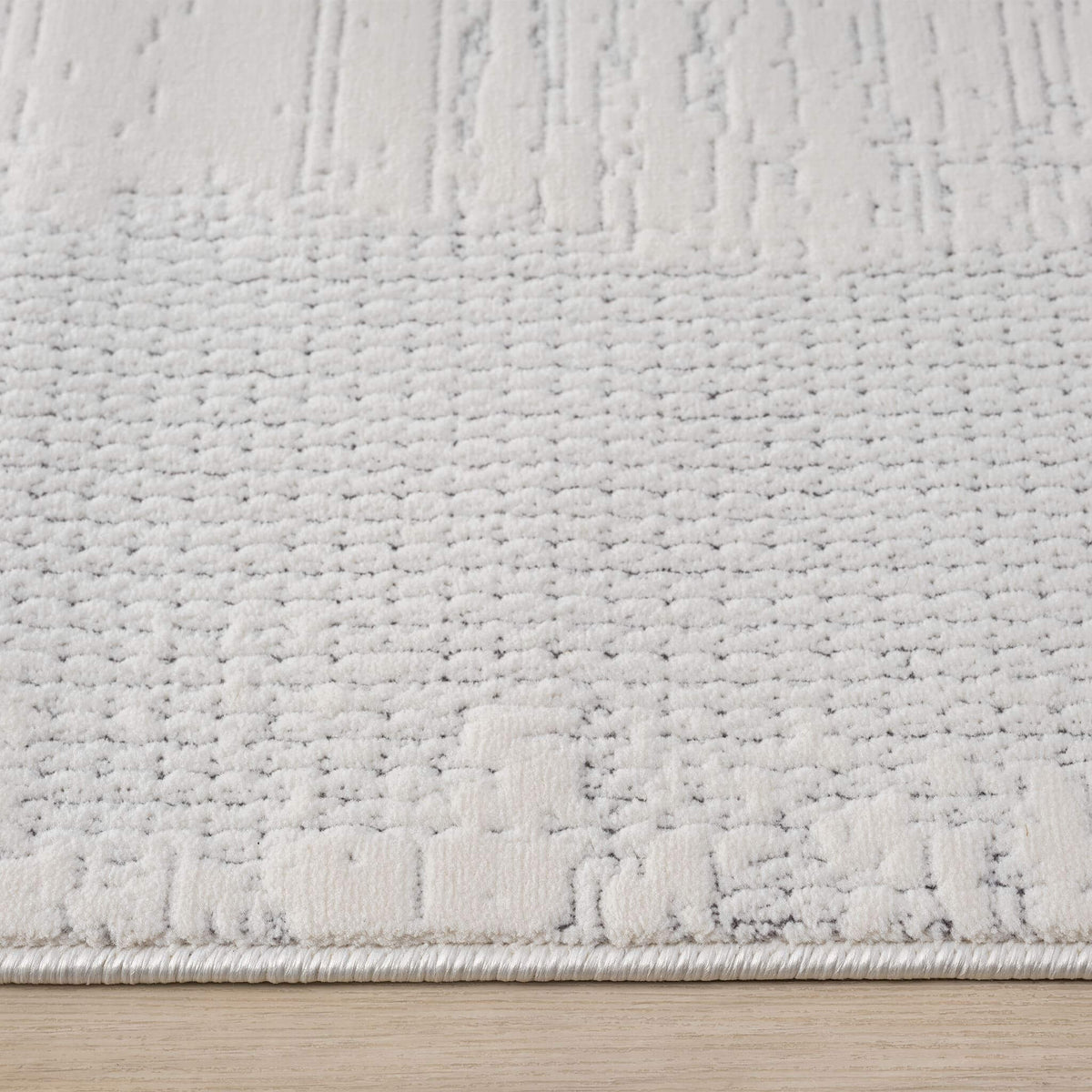 Ivory Area Rug with plush, non-shed pile and all-side binding. Power-loomed in Türkiye for durable, easy-care elegance in modern living spaces.