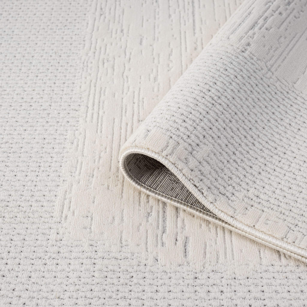 Ivory Area Rug with plush, non-shed pile and all-side binding. Power-loomed in Türkiye for durable, easy-care elegance in modern living spaces.