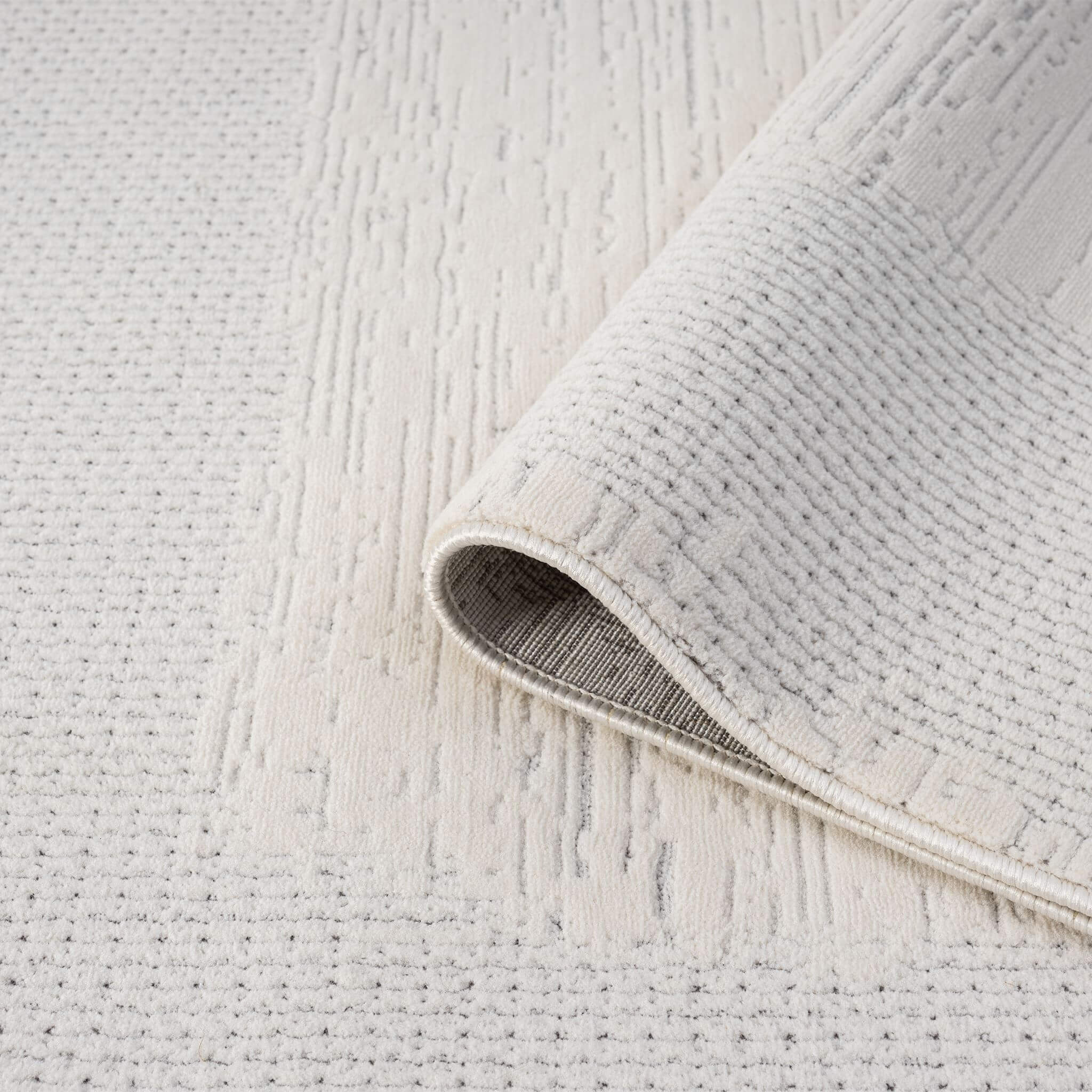 Ivory Area Rug with plush, non-shed pile and all-side binding. Power-loomed in Türkiye for durable, easy-care elegance in modern living spaces.