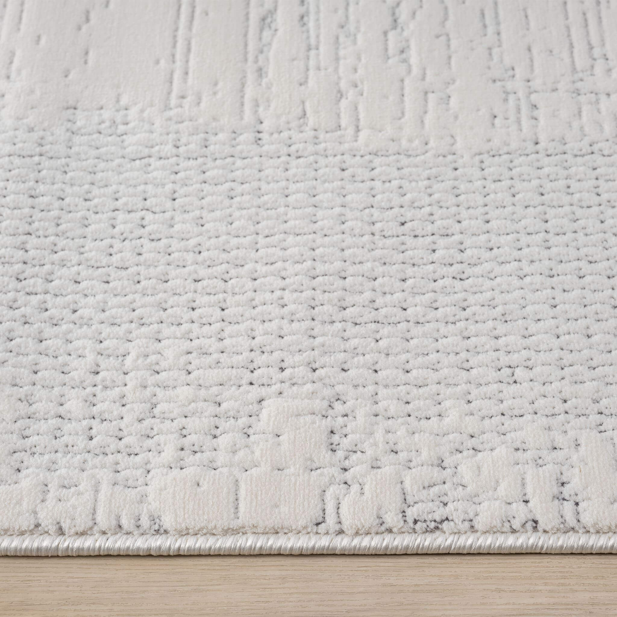 Ivory Area Rug with plush, non-shed pile and all-side binding. Power-loomed in Türkiye for durable, easy-care elegance in modern living spaces.