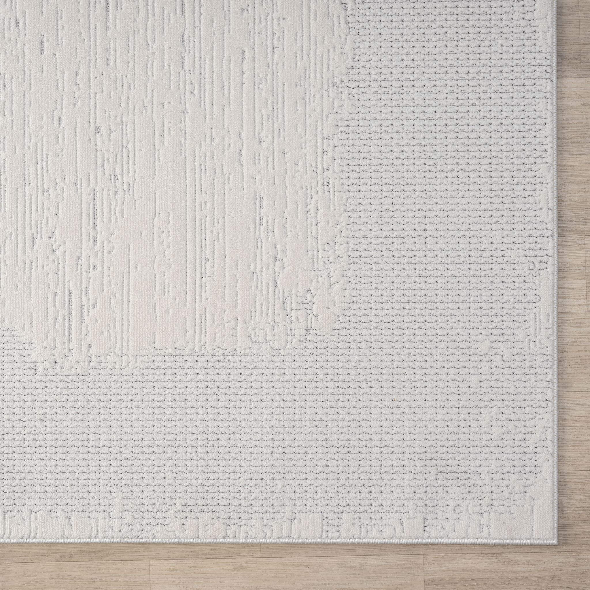 Ivory Area Rug with plush, non-shed pile and all-side binding. Power-loomed in Türkiye for durable, easy-care elegance in modern living spaces.