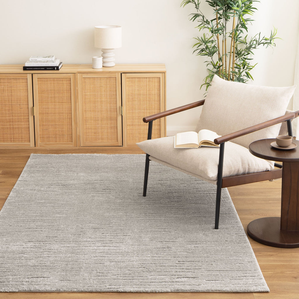 Korra K100 Grey Lines Rug styled with furniture