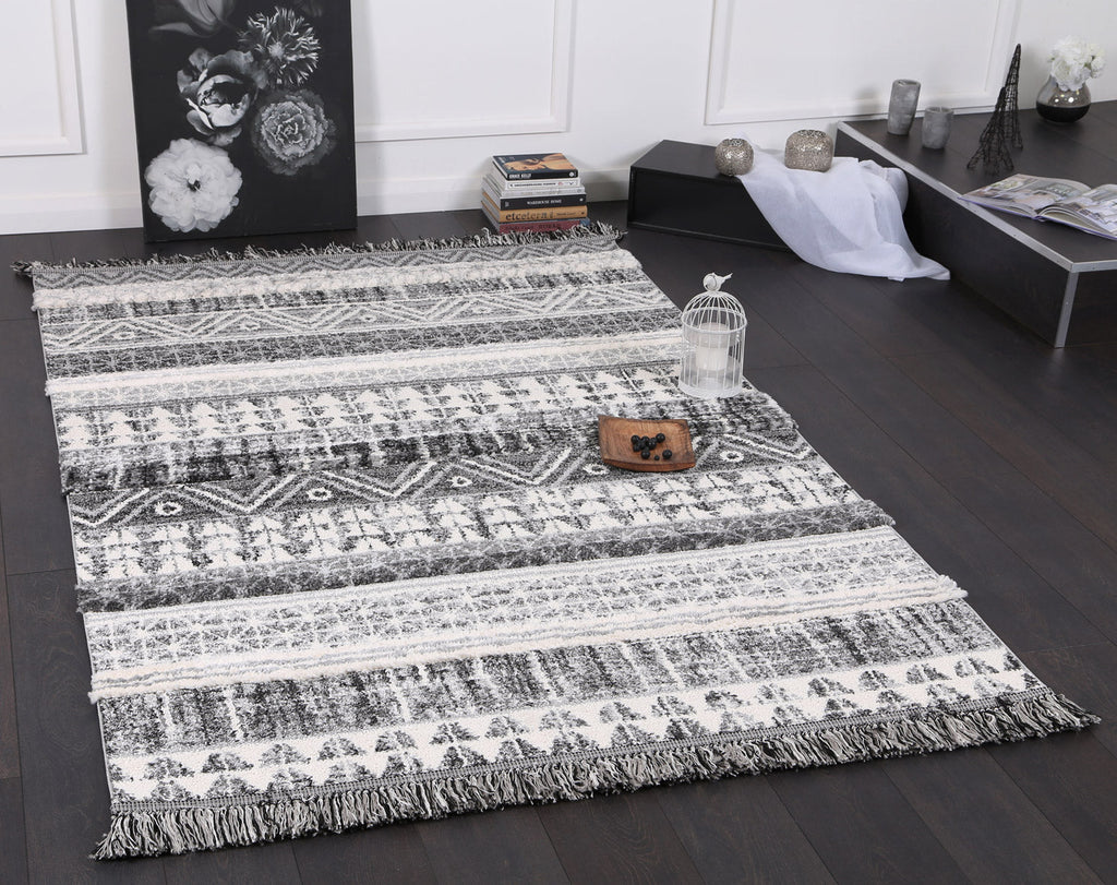 Kaza Tribal Lines Cream Anthracite Rug - 9010A GREY styled with furniture