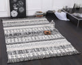 Kaza Tribal Lines Cream Anthracite Rug - 9010A GREY styled with furniture